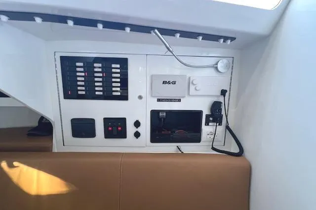 Slide: The Image of Control panel of Neo 43 Romo 2024 yacht with navigation and communication equipment. - 12