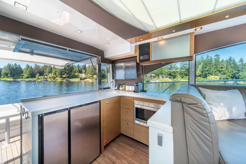 Slide: The Image of Luxurious interior of 2017 Cruisers Yachts 45 Cantius with scenic water view. - 22