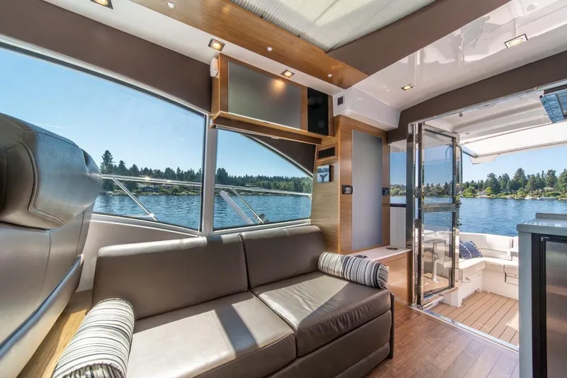 Slide: The Image of Luxurious interior of 2017 Cruisers Yachts 45 Cantius with scenic water view. - 23