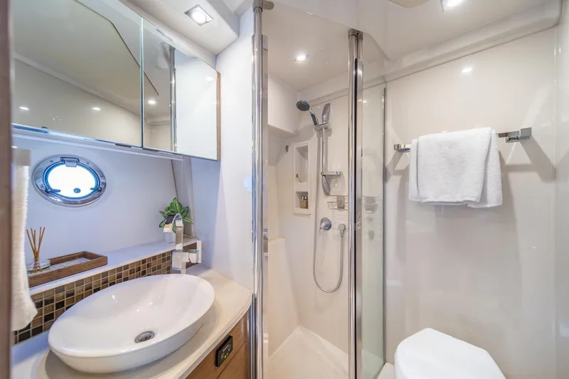 Slide: The Image of Luxurious bathroom in 2017 Cruisers Yachts 45 Cantius with modern fixtures and elegant design. - 26