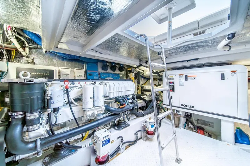 Slide: The Image of Engine room of 2017 Cruisers Yachts 45 Cantius with Kohler generator and ladder. - 37