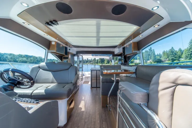 Slide: The Image of Luxurious interior of 2017 Cruisers Yachts 45 Cantius with modern seating and scenic views. - 20