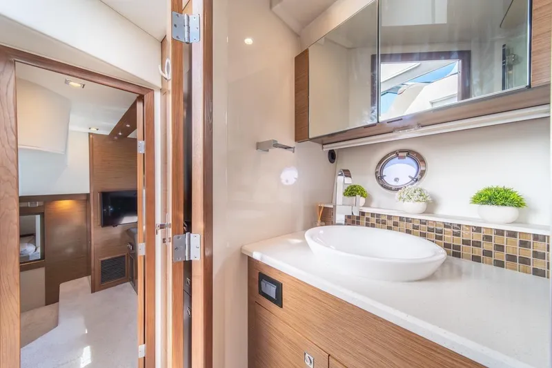 Slide: The Image of Luxurious bathroom interior of 2017 Cruisers Yachts 45 Cantius with modern fixtures and decor. - 30