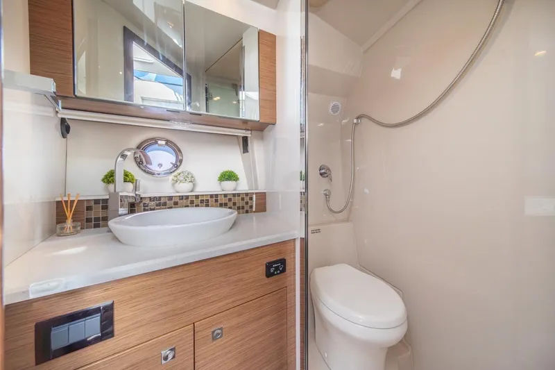 Slide: The Image of Luxurious bathroom interior of 2017 Cruisers Yachts 45 Cantius with modern fixtures and decor. - 36