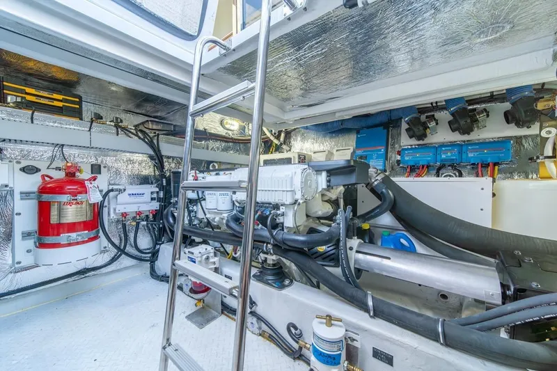 Slide: The Image of Engine room of 2017 Cruisers Yachts 45 Cantius, featuring modern equipment and safety systems. - 39