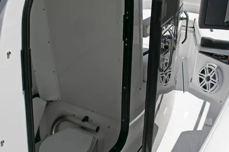 Slide: The Image of Manufacturer Provided Image: Interior view of 2026 Blackfin 302 CC boat, featuring a compact cabin space. - 18