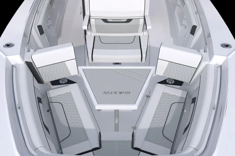Slide: The Image of Manufacturer Provided Image: 2026 Blackfin 302 CC boat interior with sleek seating and modern design. - 8