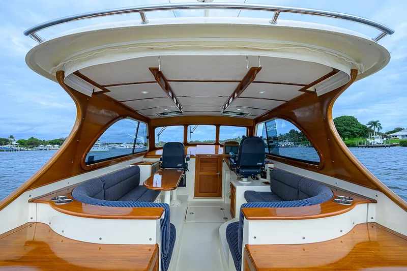 Slide: The Image of Interior of 2006 Hinckley Talaria 40 yacht with elegant wood finish and seating. - 7