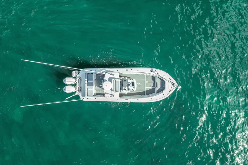Slide: The Image of Aerial view of 2021 Yellowfin 26 Hybrid boat on turquoise water. - 3