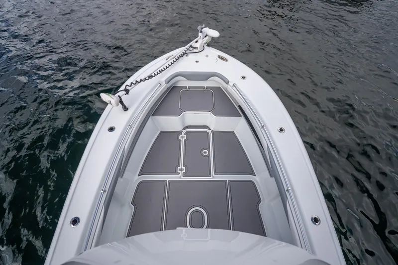 Slide: The Image of 2021 Yellowfin 26 Hybrid boat deck on water, showcasing sleek design and functionality. - 35