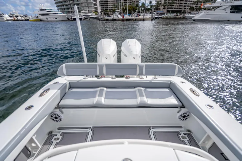 Slide: The Image of 2021 Yellowfin 26 Hybrid boat with dual engines docked at marina. - 38
