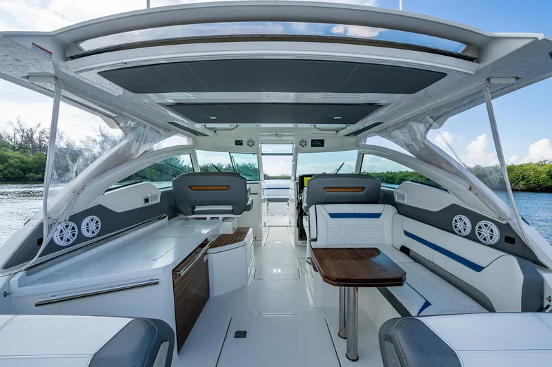 Slide: The Image of Luxurious interior of 2021 Tiara Yachts 38 LX, featuring sleek seating and modern design. - 25