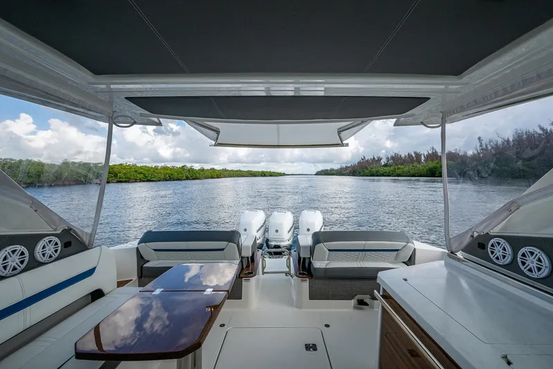 Slide: The Image of 2021 Tiara Yachts 38 LX interior with scenic waterway view. - 28