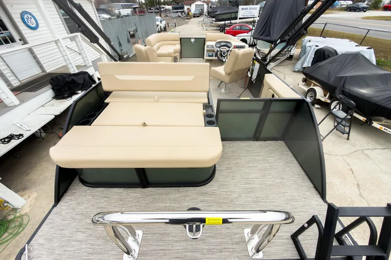 Slide: The Image of 2026 Godfrey Sweetwater Xperience 20' pontoon with beige seating and spacious deck layout. - 14