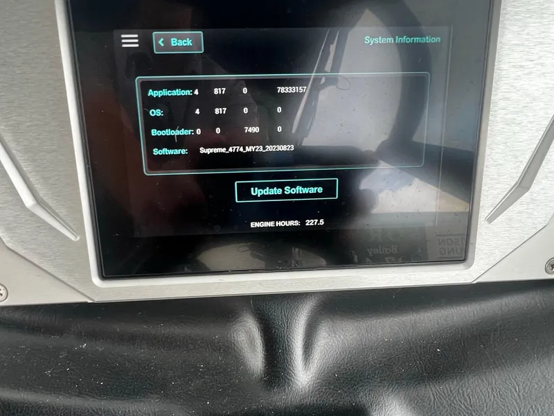 Slide: The Image of Touchscreen displaying software update options for Supreme S220, 2023 model, with engine hours shown. - 13