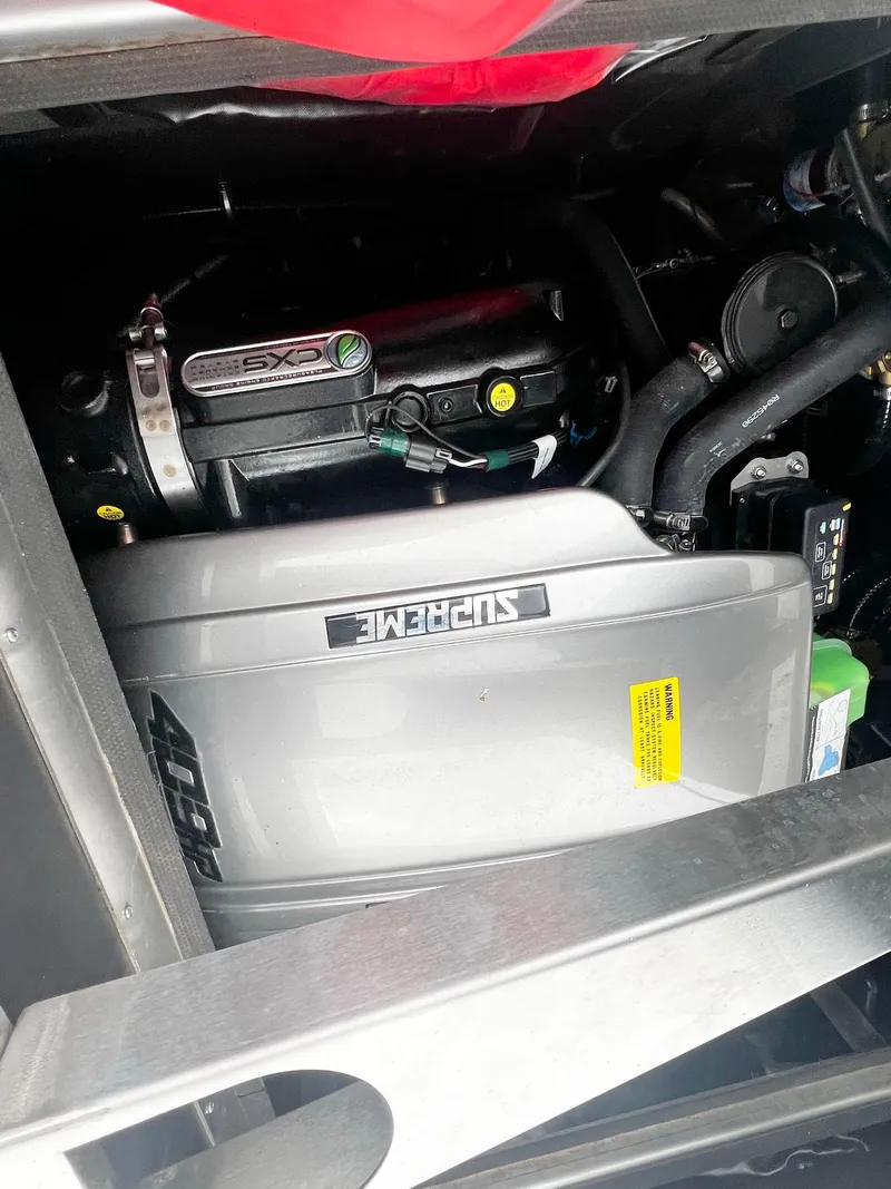 Slide: The Image of 2023 Supreme S220 engine compartment showcasing advanced mechanical components. - 14