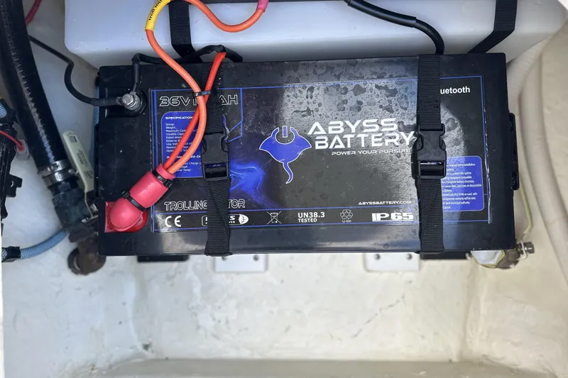 Slide: The Image of Abyss Battery installed in 2023 Cobia 240 Center Console boat, featuring IP65 protection. - 23