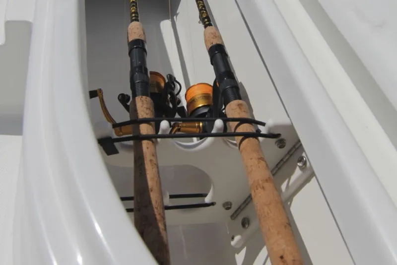 Slide: The Image of Manufacturer Provided Image: Fishing rod holders on a 2021 NauticStar 227 XTS boat. - 11