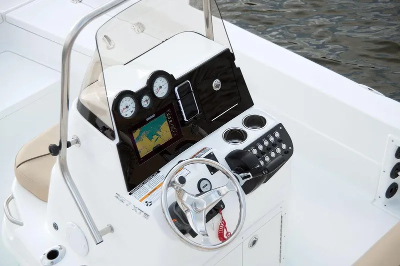 Slide: The Image of Manufacturer Provided Image: 2021 NauticStar 227 XTS boat console with navigation system and controls. - 8