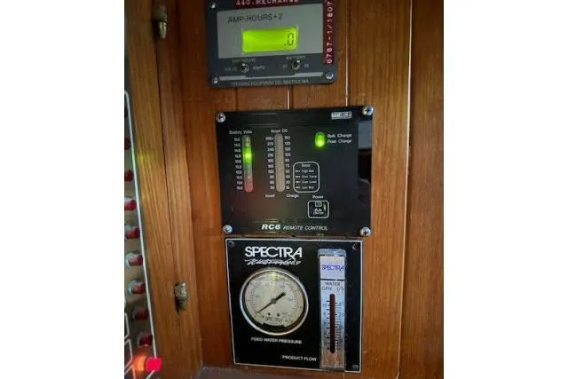 Slide: The Image of Control panel on 1982 Formosa 42 yacht with Spectra watermaker and battery monitor. - 26