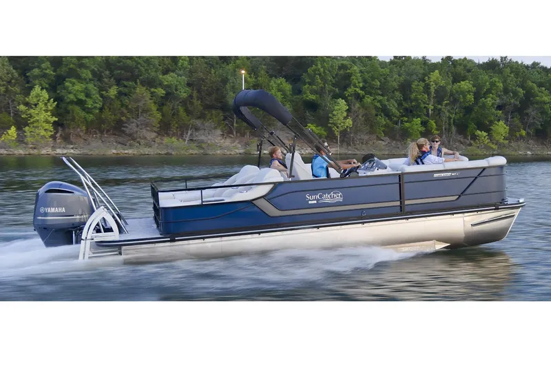 Slide: The Image of Manufacturer Provided Image: 2022 SunCatcher Fusion 324SS pontoon boat cruising on a lake. - 15