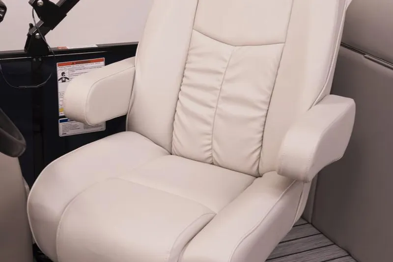 Slide: The Image of Manufacturer Provided Image: 2022 SunCatcher Fusion 324SS captain's chair with white leather upholstery. - 19