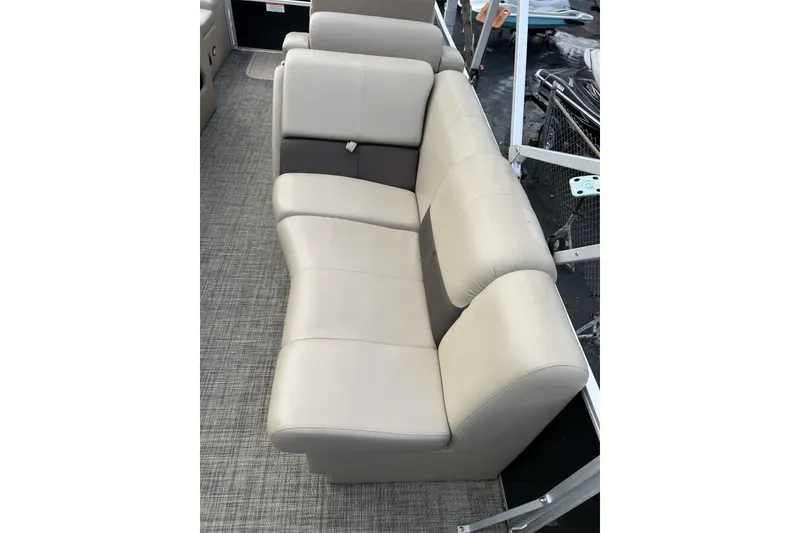 Slide: The Image of Luxurious seating on 2022 SunCatcher Fusion 324SS boat, featuring beige upholstery. - 8