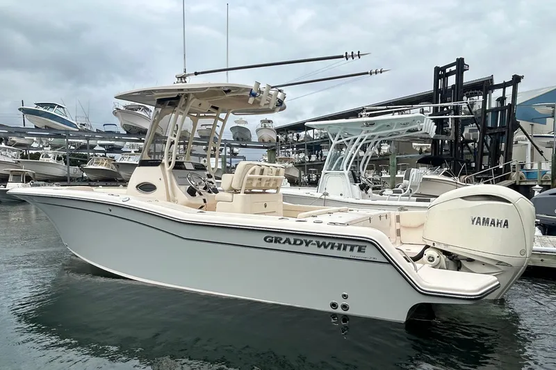 The Image of 2025 Grady-White Fisherman 236 boat with Yamaha engine docked at marina. - 1