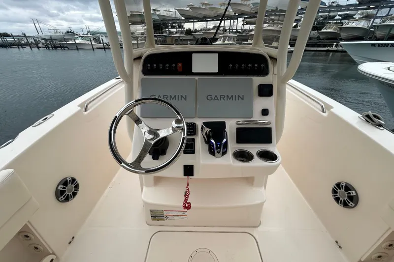 Slide: The Image of 2025 Grady-White Fisherman 236 boat console with Garmin navigation system. - 12