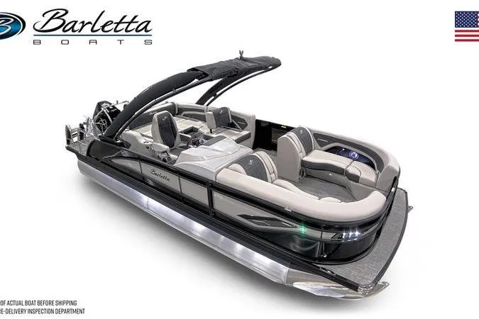 Slide: The Image of Aerial view of Rock Outdoors store with parked vehicles, including a Barletta CORSA 23 UA boat. - 9