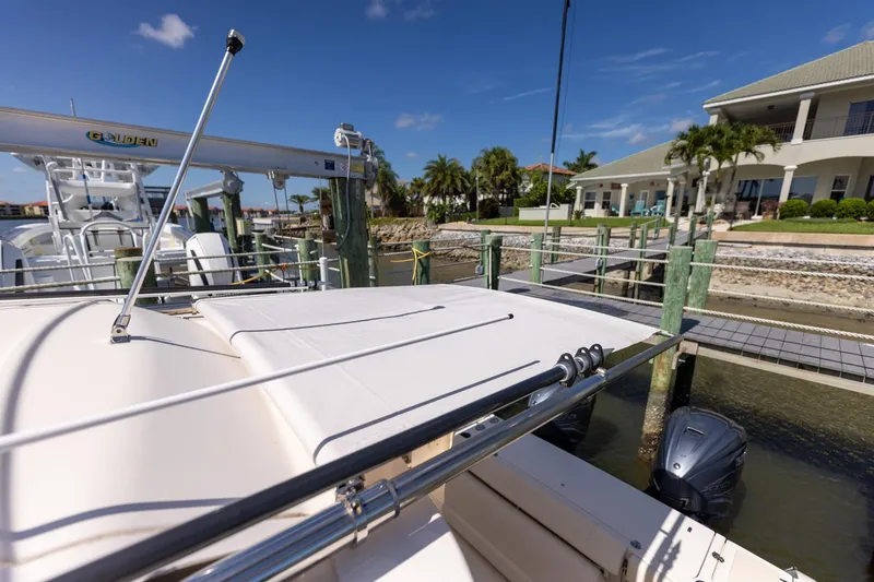 Slide: The Image of 2022 Grady-White Canyon 336 docked at a sunny marina with waterfront view. - 17