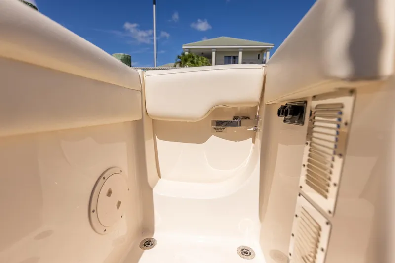 Slide: The Image of 2022 Grady-White Canyon 336 boat interior detail with clear sky background. - 39