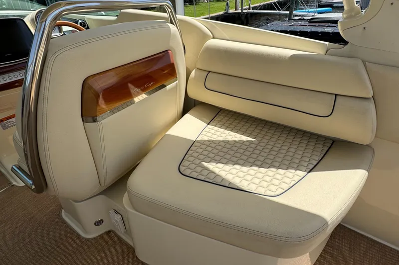 Slide: The Image of 2020 Chris-Craft Launch 31 GT interior with luxurious cream seating and elegant wood accents. - 68