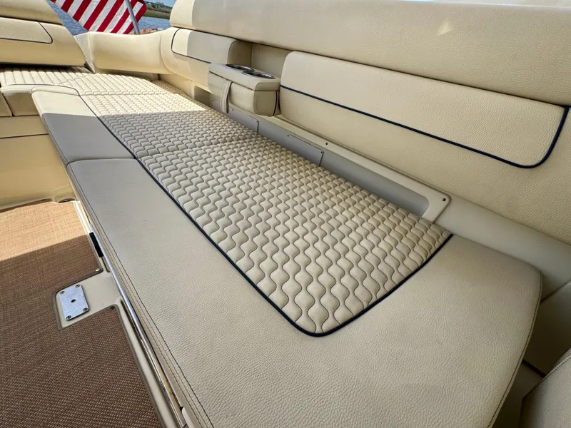Slide: The Image of Luxurious seating on 2020 Chris-Craft Launch 31 GT boat with elegant beige upholstery. - 70