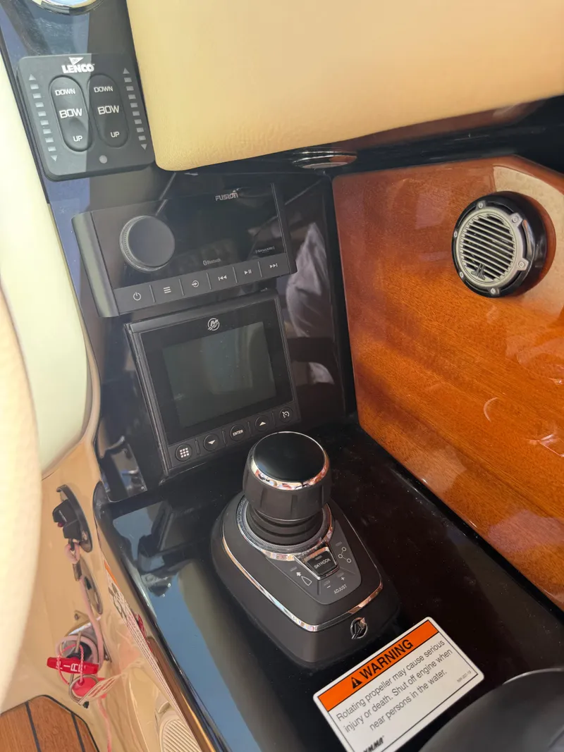 Slide: The Image of 2020 Chris-Craft Launch 31 GT dashboard with control panel and joystick. - 74