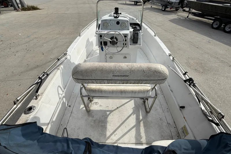 Slide: The Image of 2007 Triumph 170CC boat interior with steering console and seating. - 8