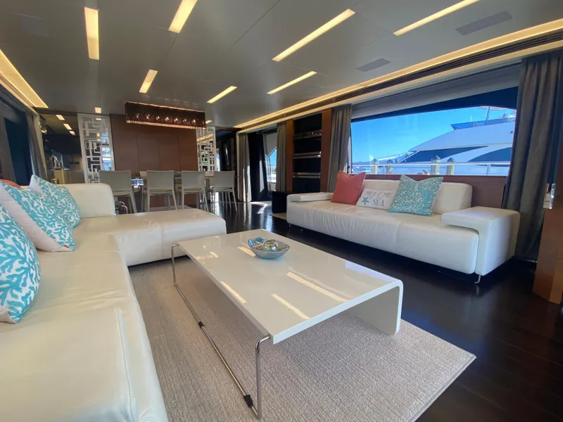 Slide: The Image of Luxurious interior of 2014 Azimut 100 Grande yacht with modern furnishings and large windows. - 13