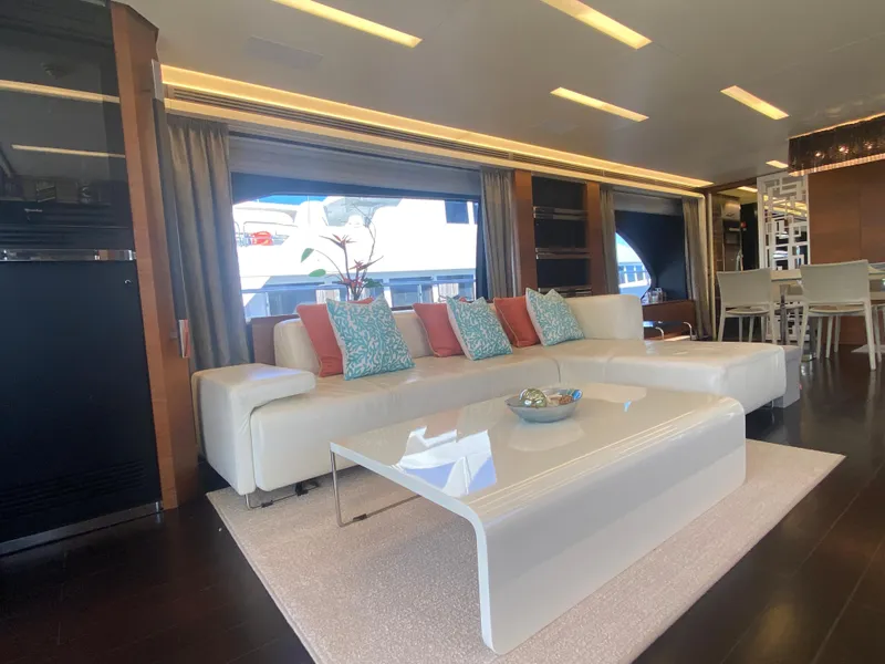 Slide: The Image of Luxurious interior of 2014 Azimut 100 Grande yacht with modern white sofa and sleek coffee table. - 14
