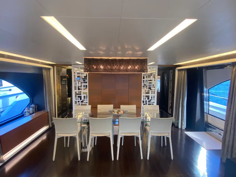 Slide: The Image of Luxurious dining area on 2014 Azimut 100 Grande yacht with modern decor. - 16