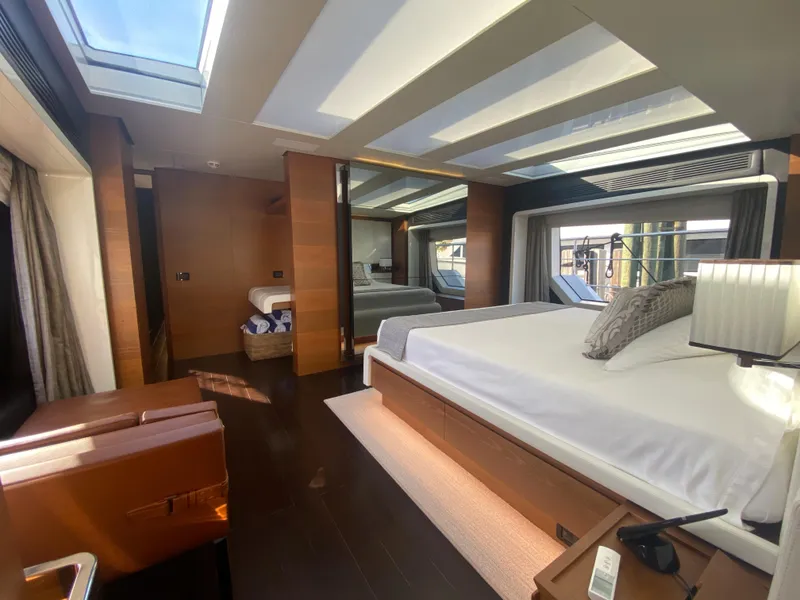 Slide: The Image of Luxurious bedroom interior of 2014 Azimut 100 Grande yacht with modern design and skylight. - 24