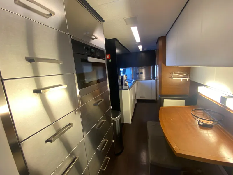 Slide: The Image of Modern kitchen interior of 2014 Azimut 100 Grande yacht with stainless steel appliances. - 34