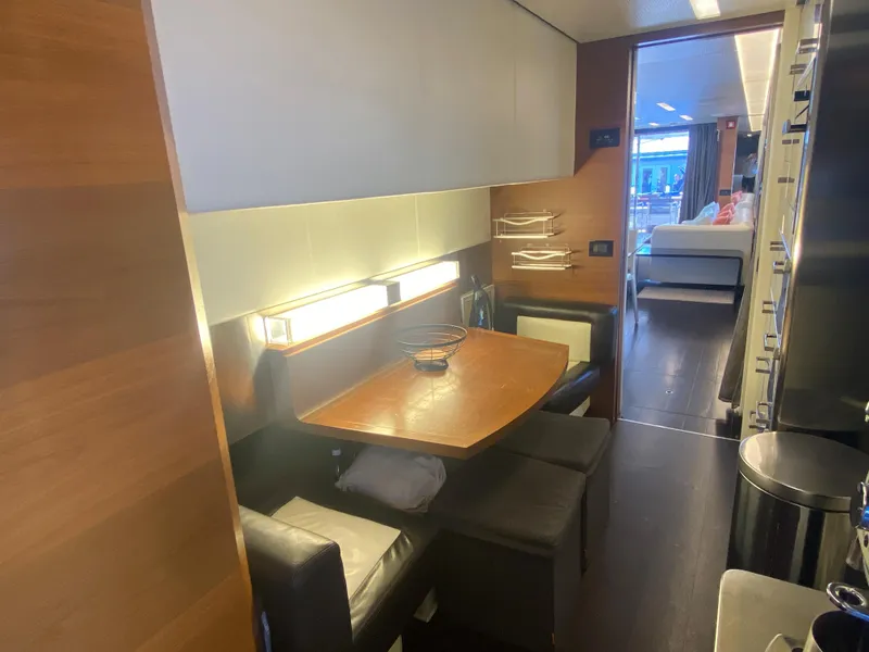 Slide: The Image of Interior dining area of 2014 Azimut 100 Grande yacht with modern furnishings. - 36