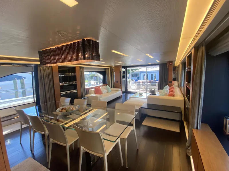 Slide: The Image of Luxurious interior of 2014 Azimut 100 Grande yacht with modern dining and seating areas. - 37