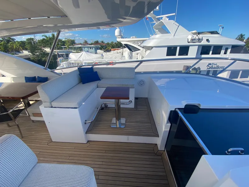 Slide: The Image of Luxurious deck of 2014 Azimut 100 Grande yacht with seating area and table. - 43