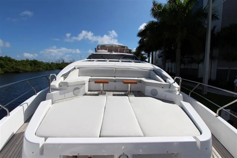 Slide: The Image of 2014 Azimut 100 Grande yacht with spacious sun deck and seating area. - 5