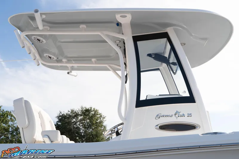 Slide: The Image of 2026 Sea Hunt Gamefish 25 boat, featuring sleek design and modern canopy. - 13