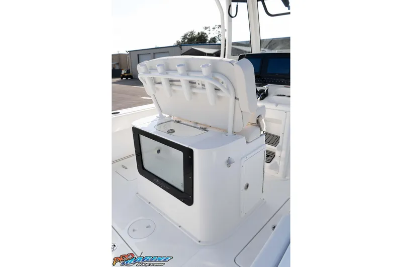 Slide: The Image of 2026 Sea Hunt Gamefish 25 boat interior with seating and storage compartment. - 18