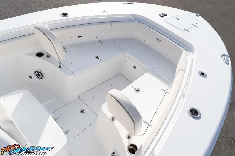 Slide: The Image of 2026 Sea Hunt Gamefish 25 boat interior with seating and storage compartments. - 29