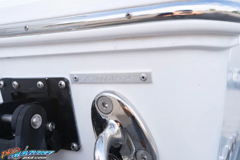 Slide: The Image of 2026 Sea Hunt Gamefish 25 boat detail with serial number and hardware. - 3