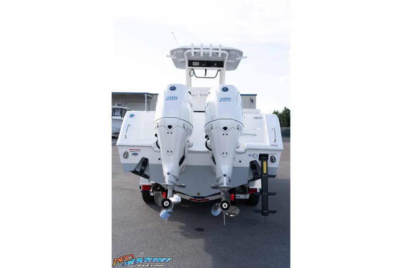Slide: The Image of 2026 Sea Hunt Gamefish 25 boat with dual 200 horsepower engines, rear view. - 4